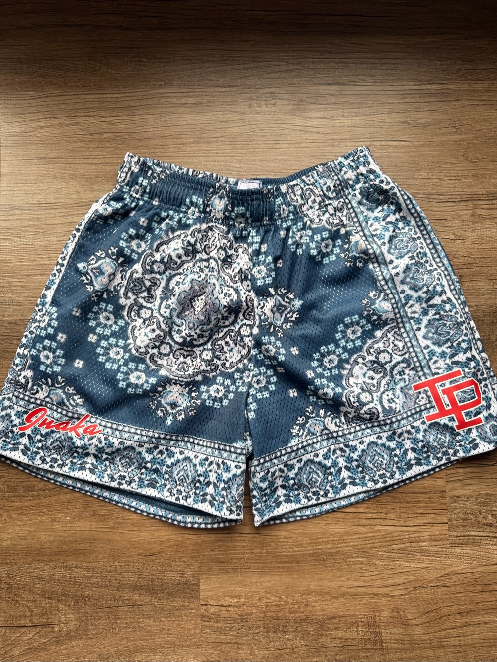 Inaka Power Teal Paisley Athletic Shorts with Red Accents